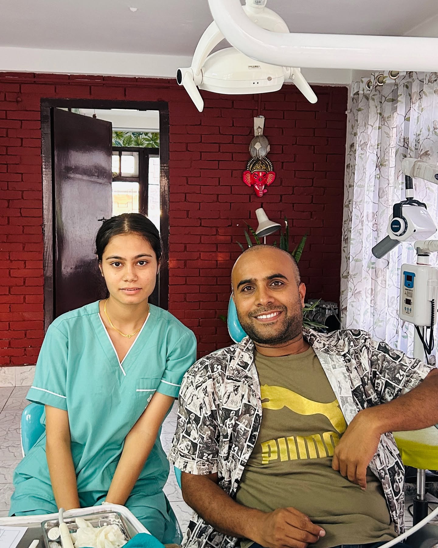 Our team member with a patient after treatment