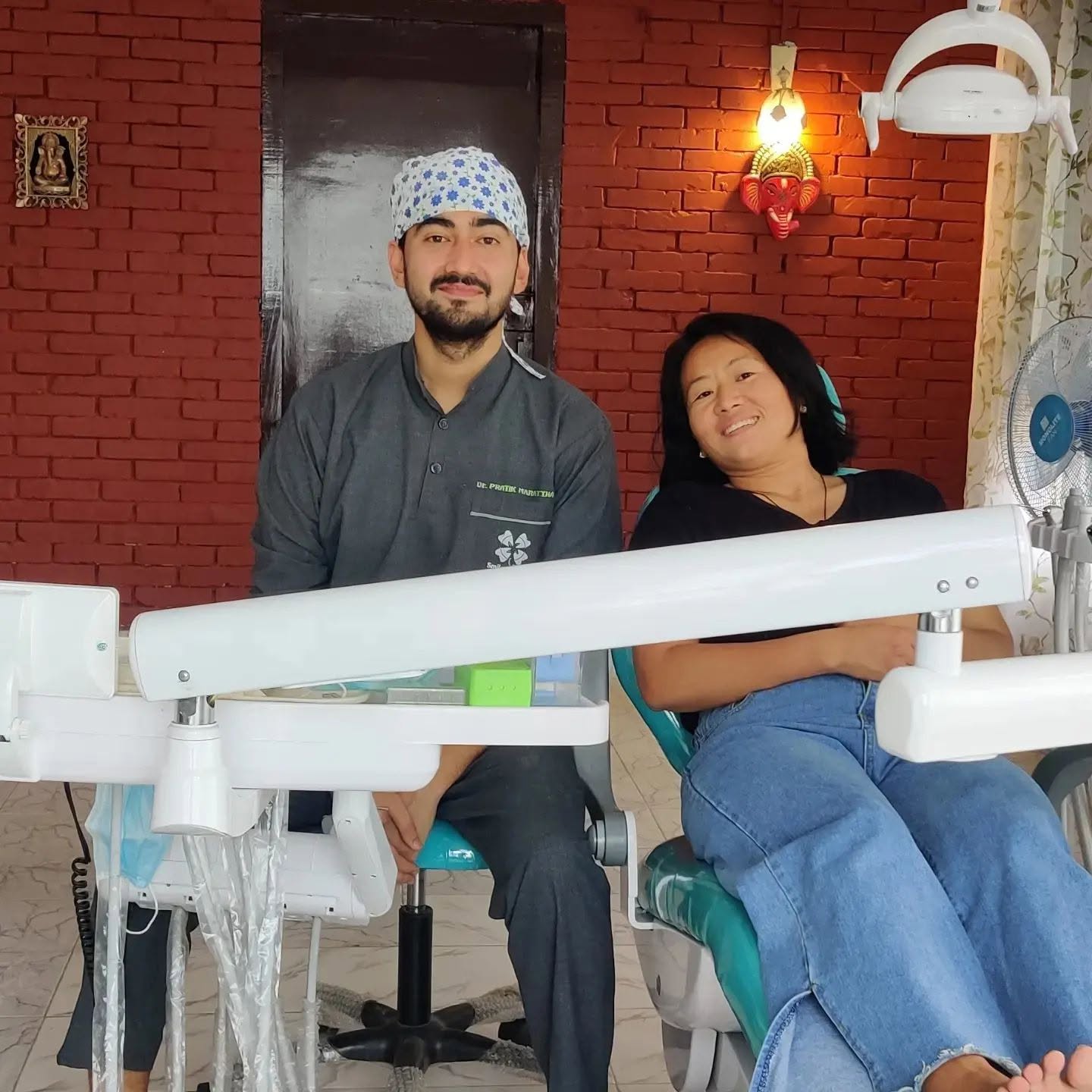 Dr. Pratik with another happy patient